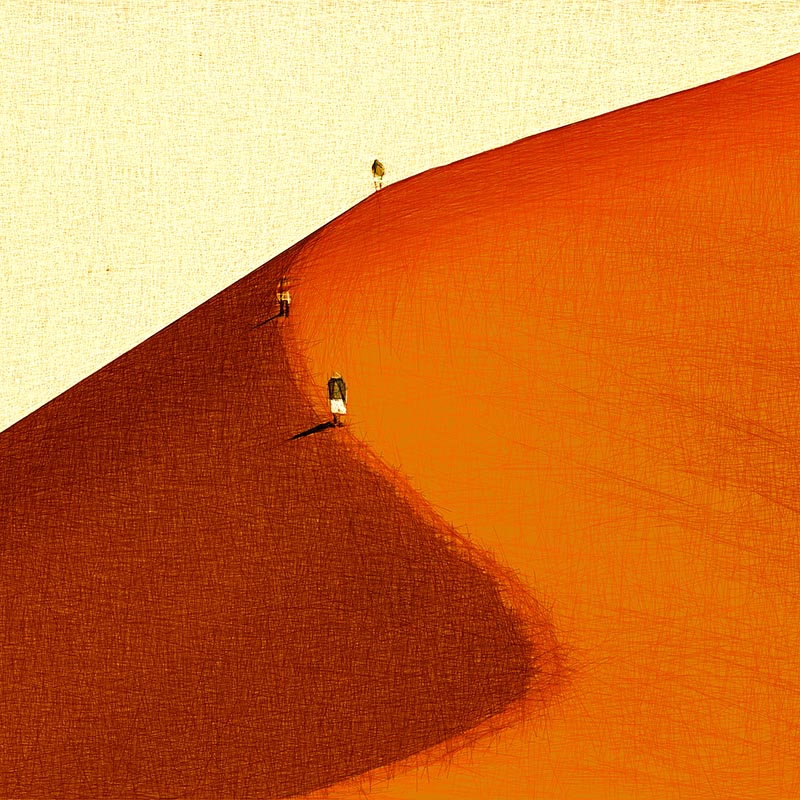 Three people walking up a sand dune